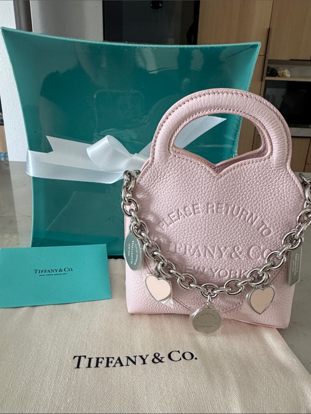 Tiffany & Co. Light Pink Pebbled Leather Mini Heart bag w Silver Charm Chain